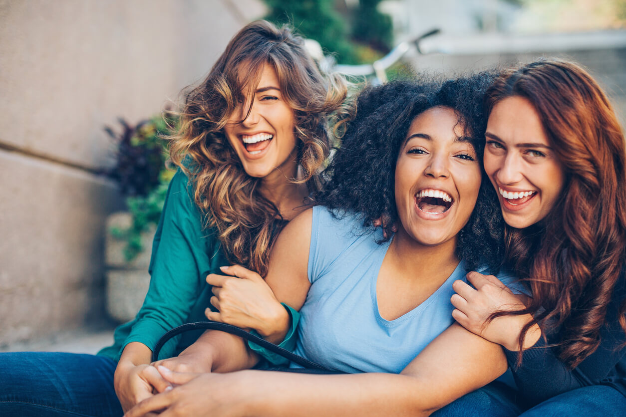 photo of a group of women laughing