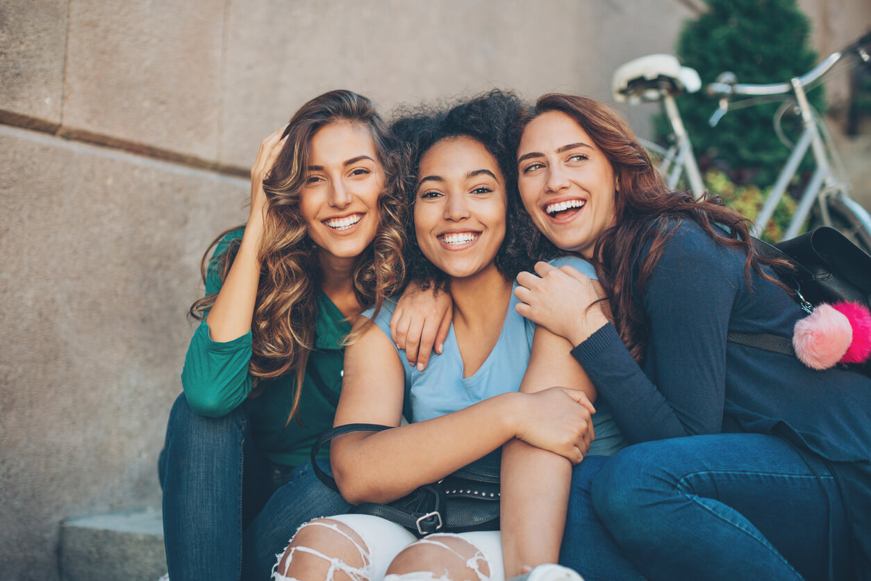 photo of a group of women laughing