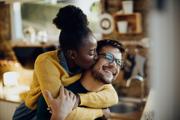 Couple hugging after seeing fertility specialist