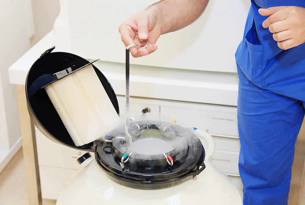 embryologist freezing eggs for cancer patients that wish to grow their families later