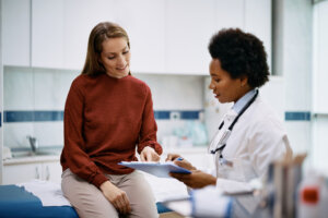 woman talking to doctor about egg freezing timeline and process