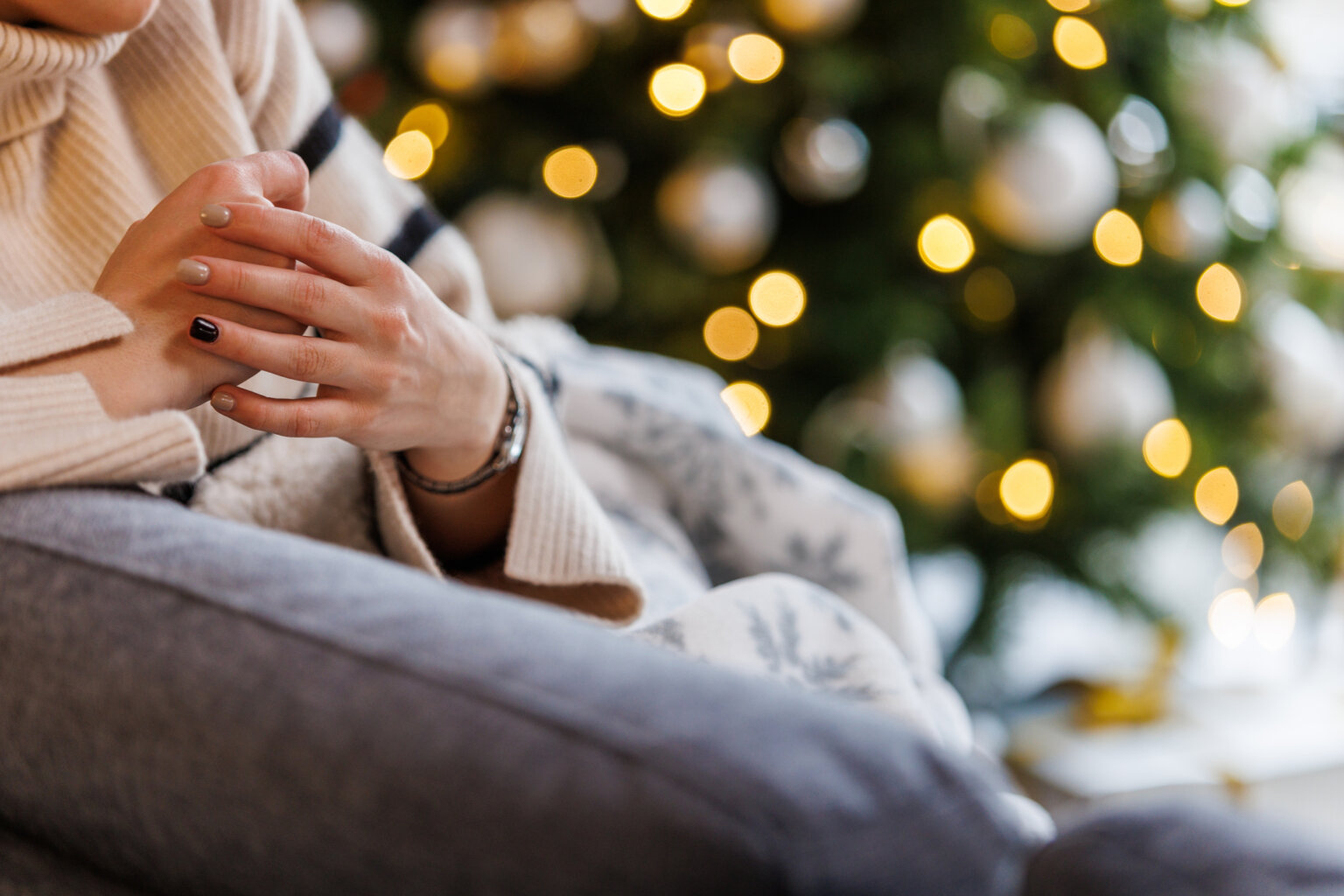 woman at home coping with infertility during the holidays