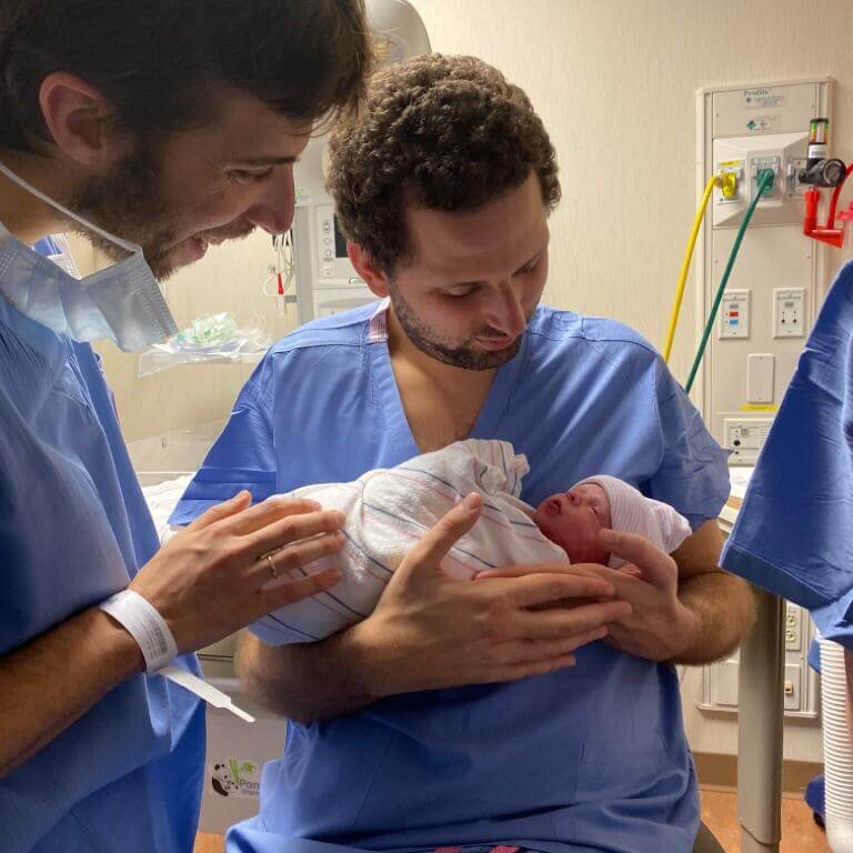 doctor holding baby